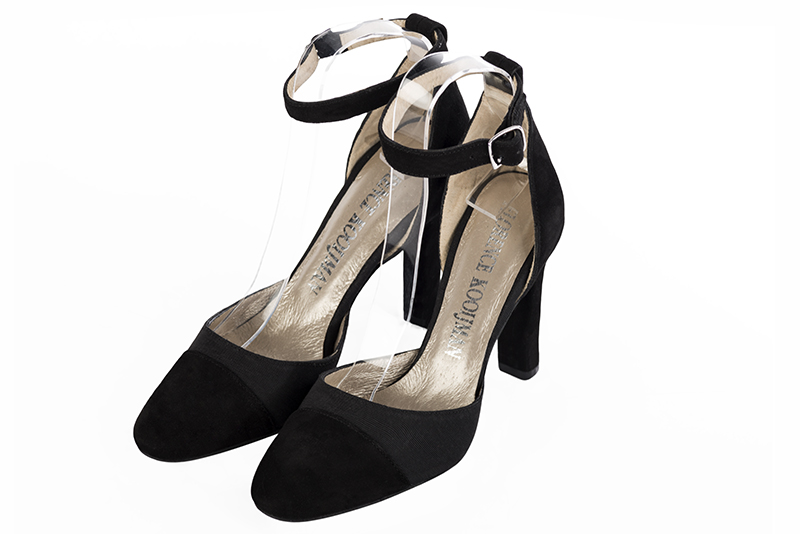 Matt black women's open side shoes, with a strap around the ankle. Round toe. Very high kitten heels. Front view - Florence KOOIJMAN